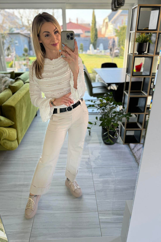 NETTI - Enyhén bő szárú nadrág. Világos bézs