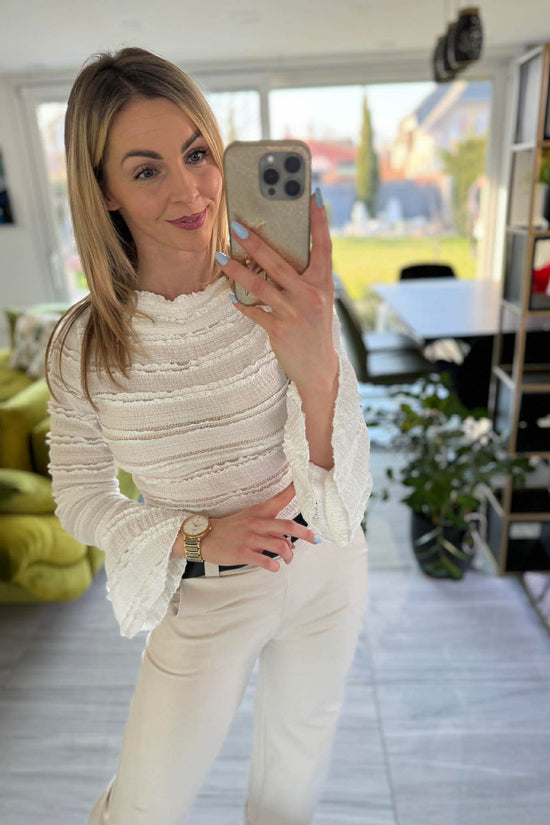 NETTI - Enyhén bő szárú nadrág. Világos bézs